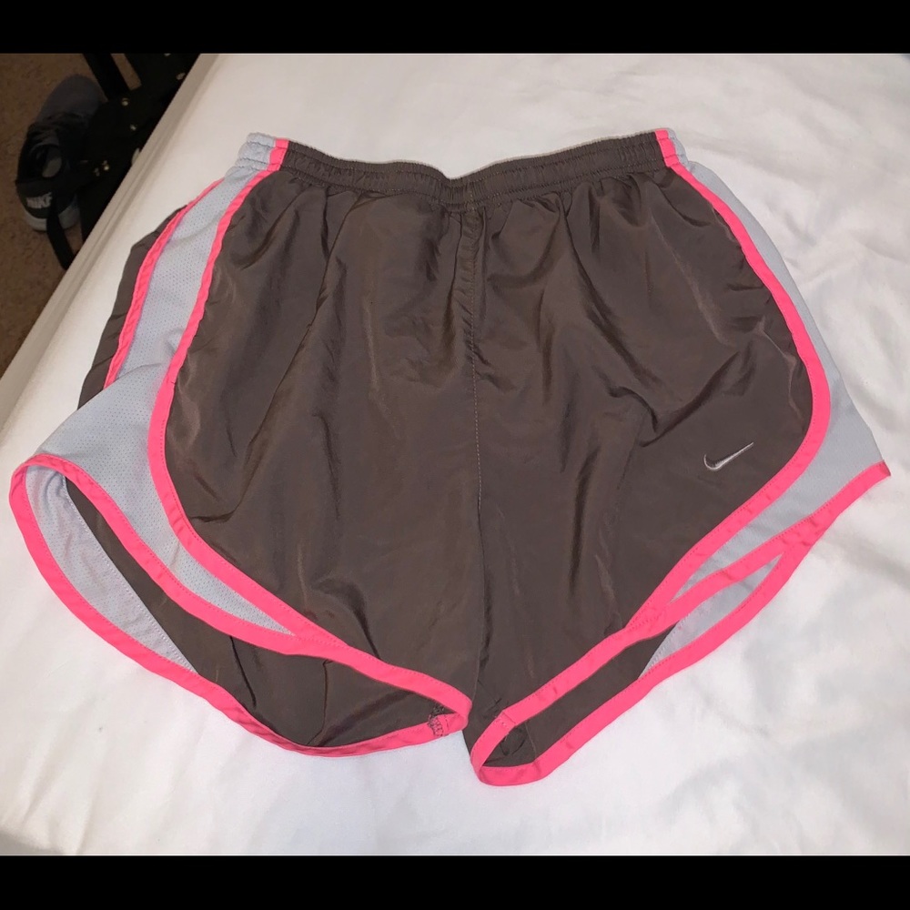 Brown Nike tempo shorts with pink and white stripe